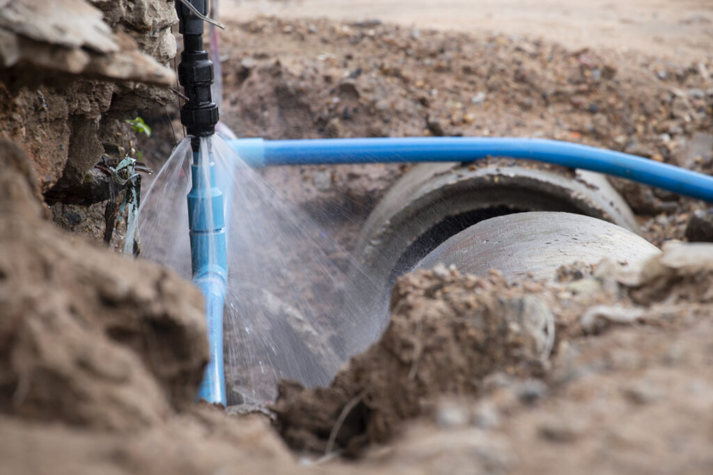 Broken water main spraying water